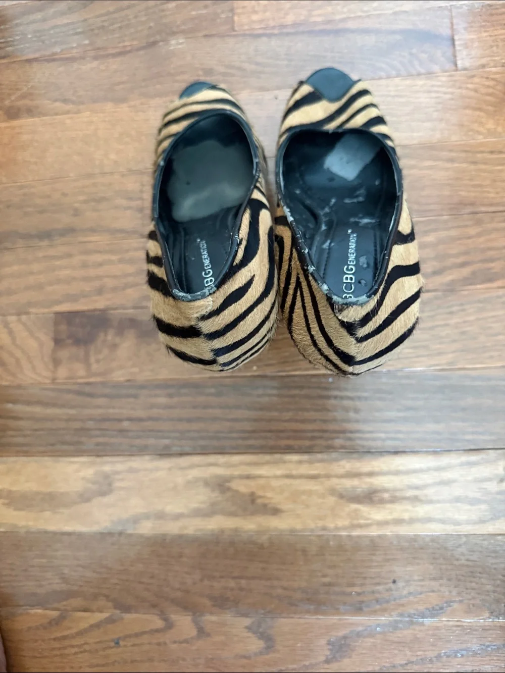 BCBGeneration Zebra-Print Peep-Toe Heels in Tan and Black